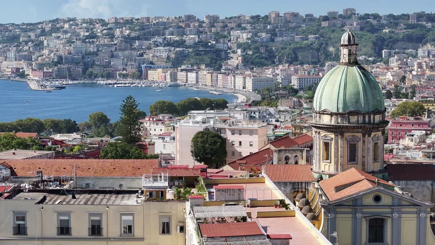 Panoramic view of Naples with dome and coastline