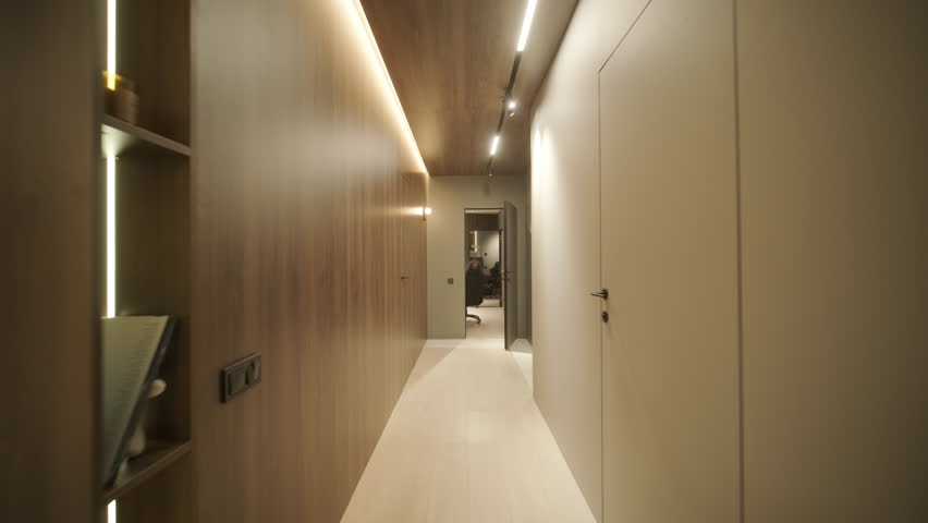 Stylish and elegant minimalist home interior featuring clean lines, neutral colors, and warm ambient lighting, creating a cozy and modern atmosphere.
