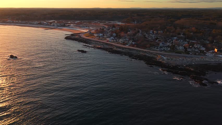 The best flight top view along the Maine Kittery ocean coast during sunset phase