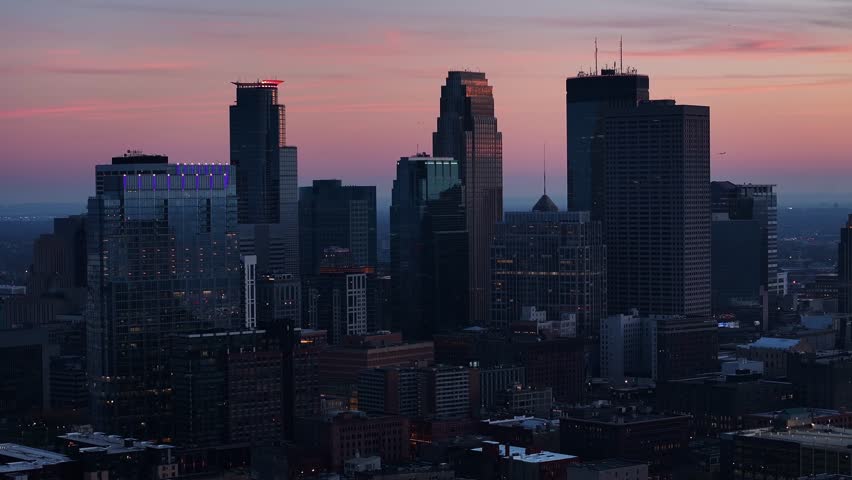 A 4k drone scene of Minneapolis Skyline Downtown Minnesota City Morning Buildings at sunset