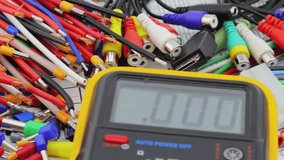 A digital multimeter for measuring the parameters of electrical circuits. Close-up. Soft focus. - Powered by Shutterstock - Get 15% off with code: PIKWIZARD15