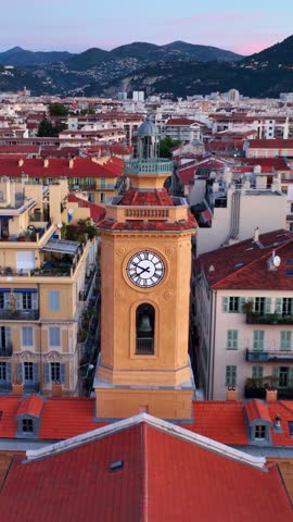 vertical video: Cote d Azur in France, drone view of luxury resort on the French Riviera, Nice seaport aerial view, Nice harbour with yachts, famous holiday destination in France. 