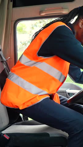 Professional truck driver maneuvering through country roads, ensuring efficient logistics and safe transportation of goods