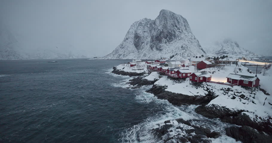 Winter scandinavian landscape over Lofoten islands, Norway spectacular seashore snowfall video