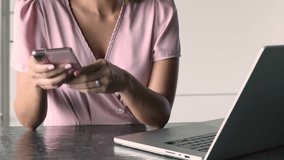 Female using smartphone and laptop, chatting, share messages, exchange information, synchronize data between two devices using cloud storage app, close up. Modern technology, communication, lifestyle - Powered by Shutterstock - Get 15% off with code: PIKWIZARD15