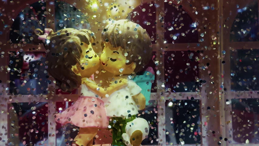 Kissing Couple Toys and Shiny Flying Dots