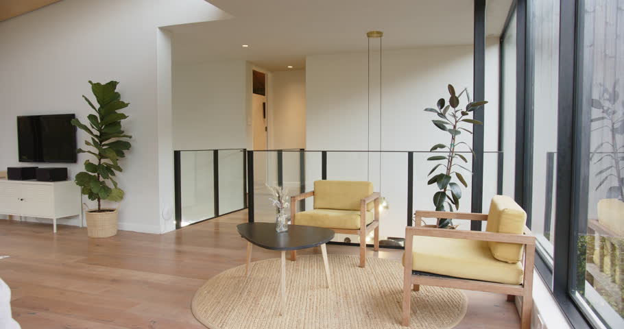 Modern living room with indoor plants, cozy seating area, and natural light, copy space. Interior, decor, home, furniture, living space