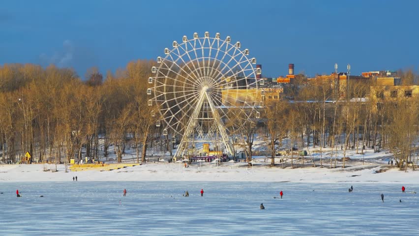 Ferris wheel in amusement park in time-lapse video. Tourist place in Cherepovets.