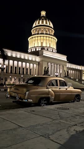 Havana architecture, capitol in cuba, night city, capitol with illumination, main square in havana, retro car on the street of havana in front of the capitol, city center