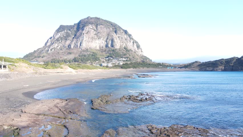 Mountain Sanbangsan and sea in Jeju island, aerial view.