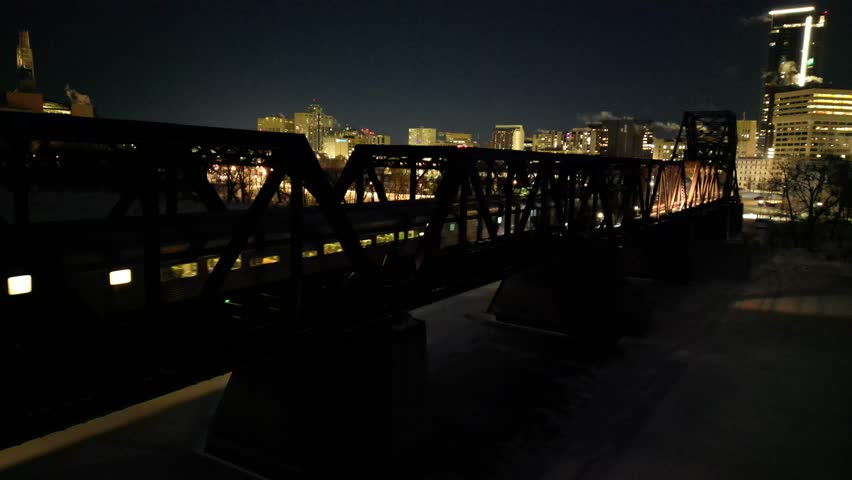 VIA Rail The Canadian passenger trains arrives into Winnipeg on cold winter night, drone aerial