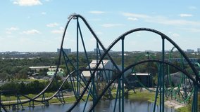 Excited fun of enjoying thrilling rollercoaster at amusement park in Orlando, Florida. - Powered by Shutterstock - Get 15% off with code: PIKWIZARD15