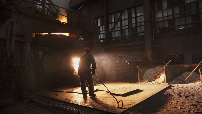 Industrial Metal Smelting Operations are carried out in a dedicated Industrial Factory Setting. Stock Clip