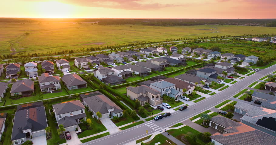 Wealthy neighborhood with expensive houses in southern Florida. Development of US premium housing market