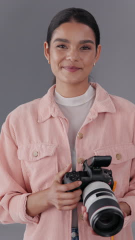Happy woman, photographer or photoshoot with camera for digital marketing at studio or modeling agency. Portrait, female person or videographer with smile or technology for production or film making