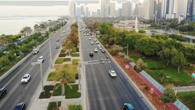 Abu Dhabi traffic drone footage. Cars traffic aerial. UAE highway with cars. - Powered by Shutterstock - Get 15% off with code: PIKWIZARD15