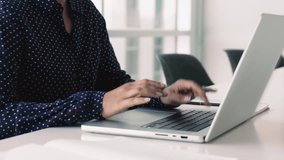 Close up crop view female hands typing on laptop keyboard, freelancer working on project, preparing presentation or websurfing information, spend time on internet, texting email, communicate remotely - Powered by Shutterstock - Get 15% off with code: PIKWIZARD15