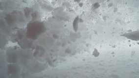 Snow avalanche sliding down a mountainside and crush into camera , super slow motion - Powered by Shutterstock - Get 15% off with code: PIKWIZARD15
