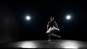 Talented ballerina jumping on stage, slow motion, grace and beauty of dancer. Classic ballet performance, solo of professional ballerina, hobby and profession, theatrical performance, school of arts - Powered by Shutterstock - Get 15% off with code: PIKWIZARD15