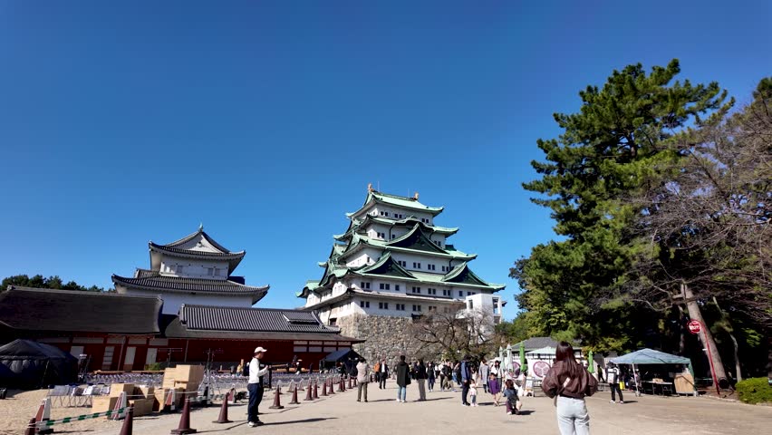 Nagoya , Japan - 11 07 2024: Visitors Enjoying a Beautiful Day at Nagoya Castle During Autumn