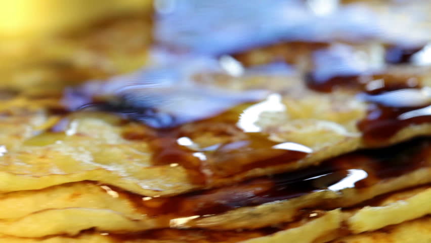 Appetizing fried pancake rotates in the frame in focus close-up