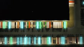 Large American warehouse with logistics trucks, featuring animation of advanced AI optimizing cargo sorting. Aerial top-down view - Powered by Shutterstock - Get 15% off with code: PIKWIZARD15