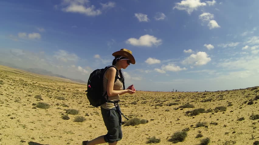 Woman traveler in the desert, Fuerteventura, Canary Islands
