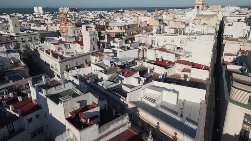 Descending aerial footage of old town Cadiz, Andalusia, southern Spain.