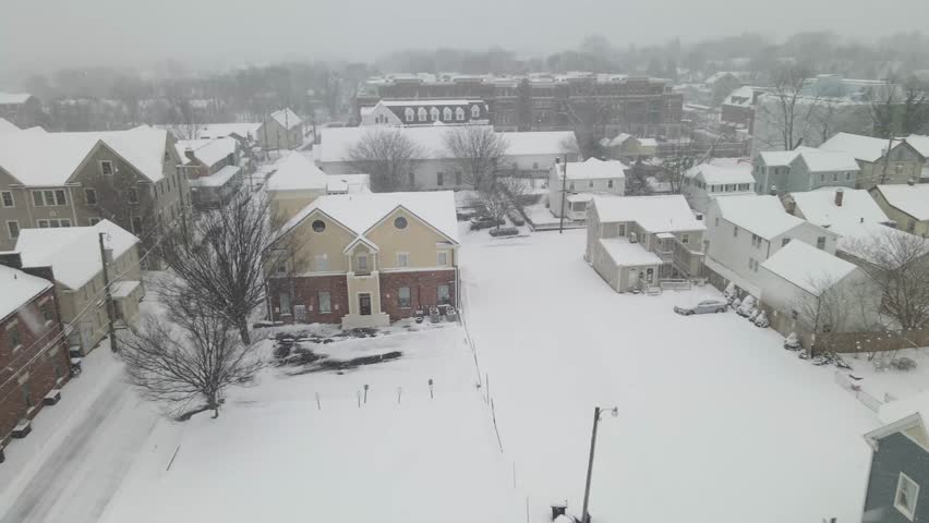 Snowfall in the historic town of Leesburg, Virginia. View from a drone.

