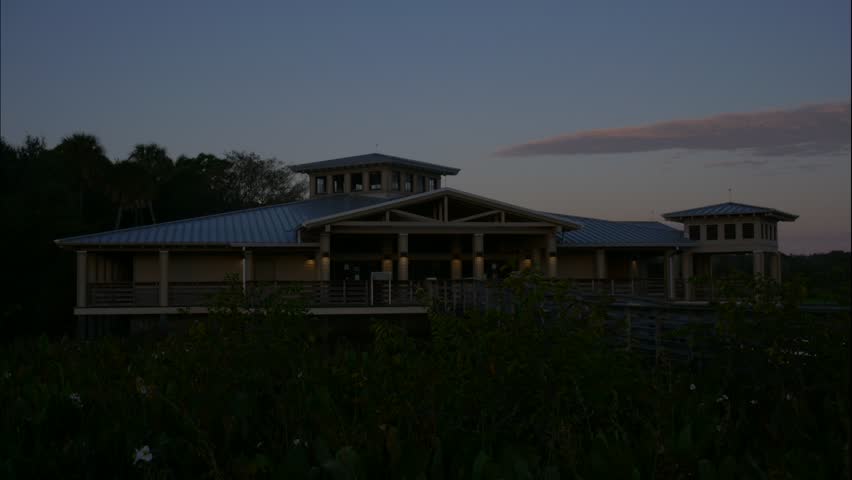 Green Cay Wetlands Nature Preserve, Boynton Beach, Florida - Sun rises to illuminate the visitor center in an early morning time-lapse.