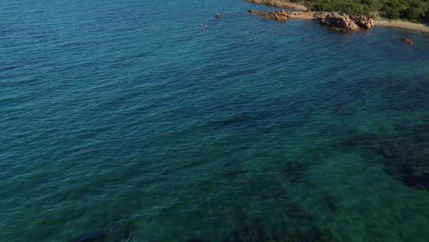 Aerial view of mediterranean coastline in Sardinia, Italy.
