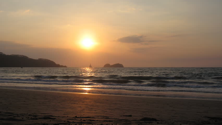 COSTA RICA - MAR 2013: Timelapse shot of Playas Hermosa during sunset in Costa