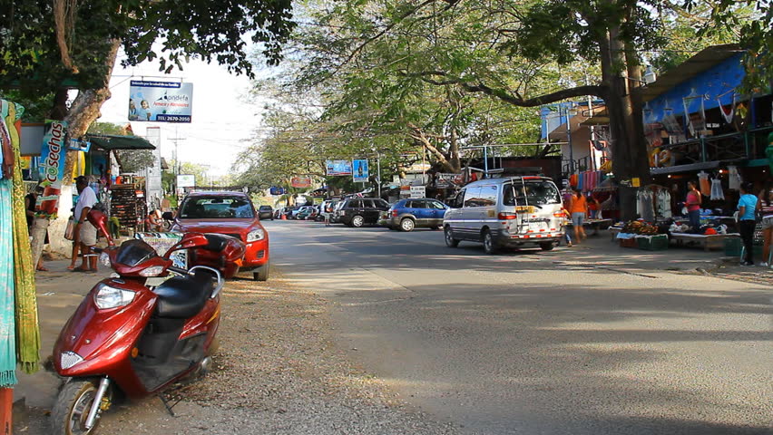 COSTA RICA - MAR 2013: The shopping strip of Playas del Coco with tourists and
