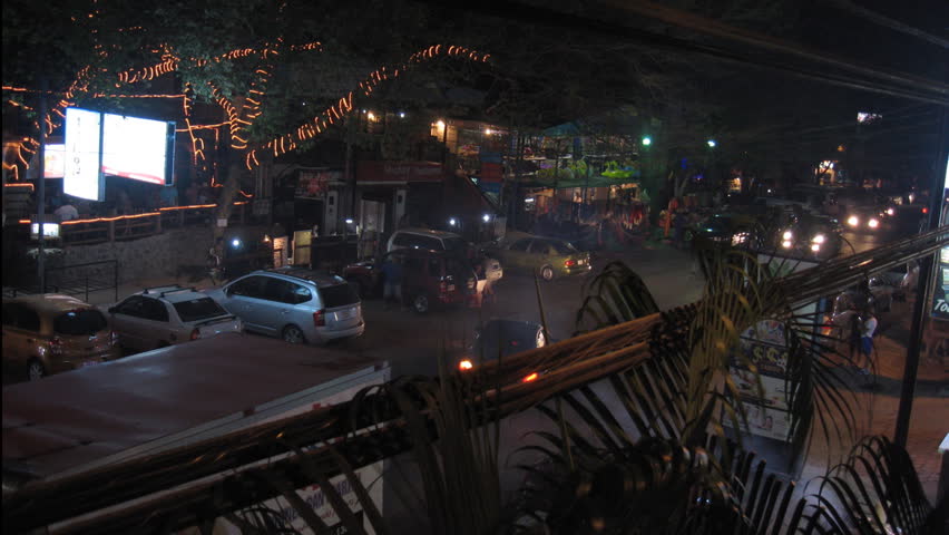 Night timelapse shot of the active nightlife of Playas del Coco in Costa Rica,