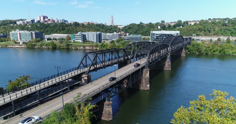A slowly moving forward aerial view of the Hot Metal Bridge over the Monongahela River on Pittsburgh