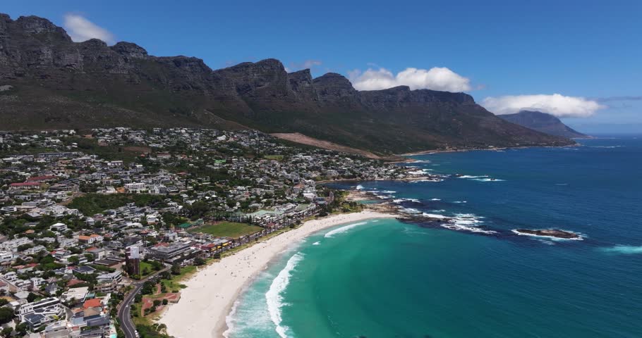 Spectacular Drone Shot Reveals Camps Bay Beach, Twelve Apostles Mountain Range in Background