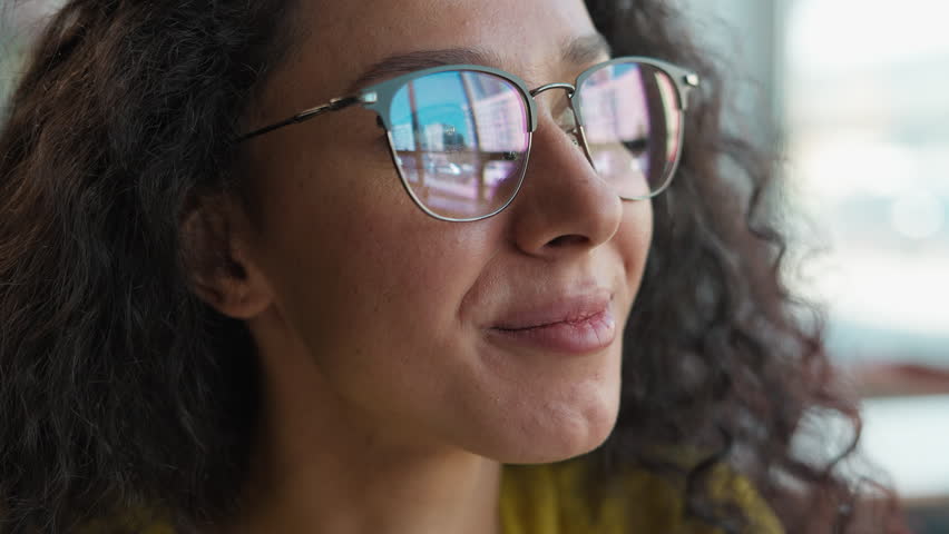 Close up face Arabian Indian Hispanic Latina woman female girl student study learning thinking solution glasses health vision sight contemplate ponder high school reflect university library education - Powered by Shutterstock - Get 15% off with code: PIKWIZARD15