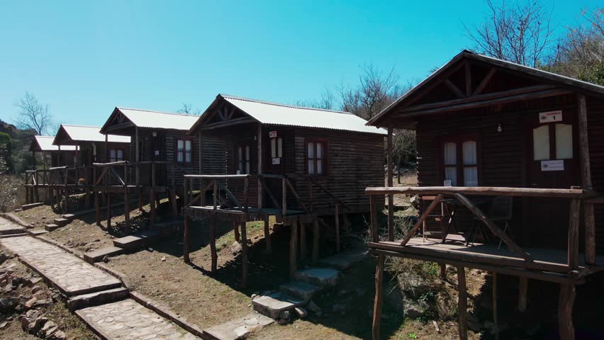 drone traveling orbital wood cabins