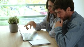 A couple working together to manage their finances, reviewing household expenses, including heating costs, utility bills, and food, on a laptop, while planning how to cover their monthly payments with - Powered by Shutterstock - Get 15% off with code: PIKWIZARD15