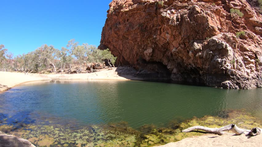 Pound of Ormiston Gorge in West MacDonnell Ranges National Park, Northern Territory, Australia, Outback Red Center. Ormiston Gorge is a permanent waterhole to swim or see the high walls of gorge