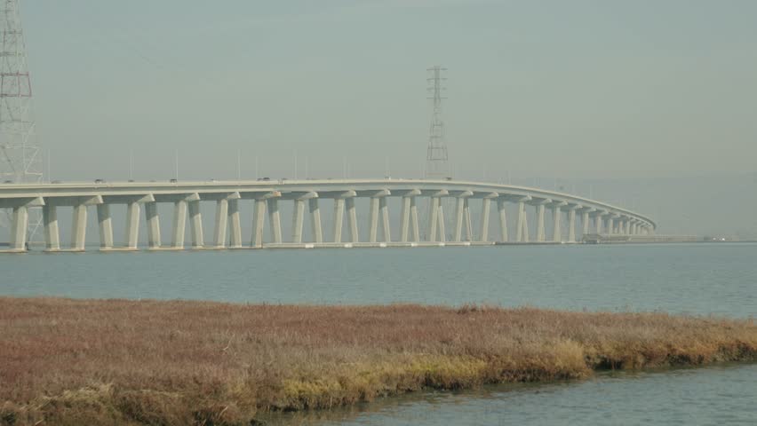 Cars driving over the Dumbarton Bridge over the San Francisco bay