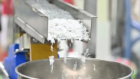 The slow motion scene of vibration conveyor deliver the recycle plastics. The plastic recycle process.  - Powered by Shutterstock - Get 15% off with code: PIKWIZARD15