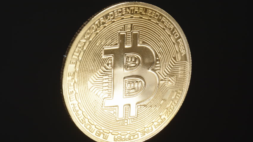 Bitcoin Coin Spinning in a Loop with Intricate Circuit Patterns Visible During Continuous Rotation. Set Against a Smooth Black Background.