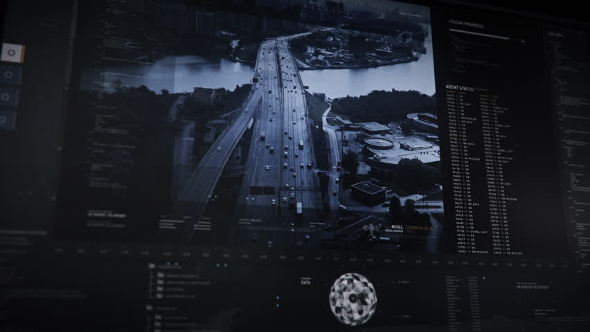 Hi-tech tracking software broadcasting the drone live feed. Hi-tech tracking software looking for criminals in a city. Hi-tech tracking software has detected the stolen vehicle on the bridge. Police.