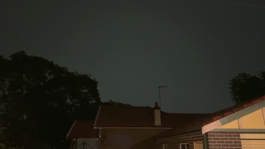 Thunderstorm on a Dark night in inner Sydney Suburb of Caterbury with strong rain lightning thunder strong winds Sydney Inner Western Suburbs NSW Australia