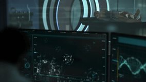 Inside a Research Laboratory. Modern Computer Monitors. Scientist using a Biomedical Software. Group of Viruses on Screen. Coronavirus detected. Studying Coronavirus Structure. Data of the Virus. - Powered by Shutterstock - Get 15% off with code: PIKWIZARD15