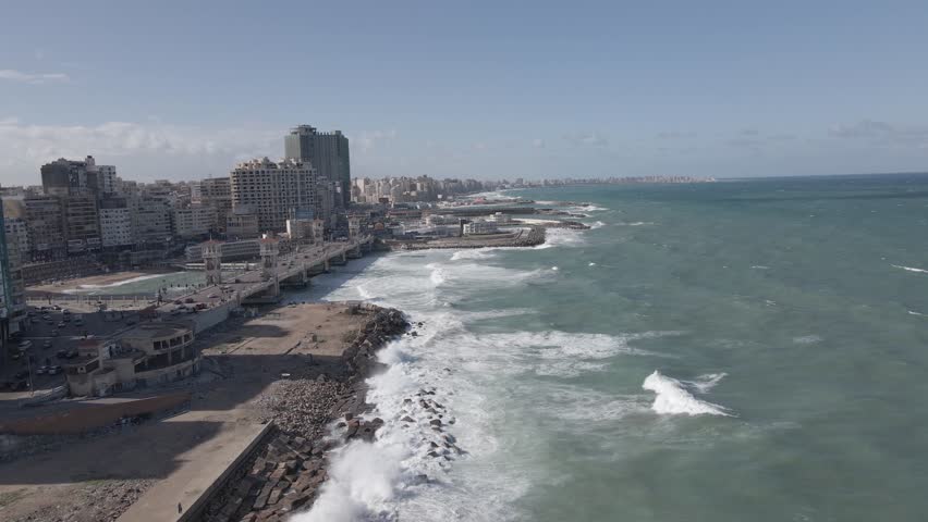 Aerial drone footage of the Mediterranean Corniche in Alexandria, Egypt.