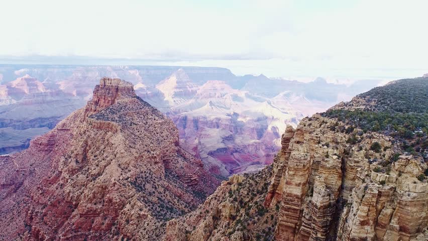The Grand Canyon National Park, layered red cliffs, unique terrain, drone, 4K