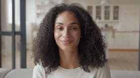 Woman Celebrating Job Offer on Video Call in Living Room - Powered by Shutterstock - Get 15% off with code: PIKWIZARD15