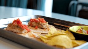 Mexican Food Fiesta. Family and friends around the table together. Corn, tortilla chips, cheese, tacos, salsa, chilies, and beef dishes - Powered by Shutterstock - Get 15% off with code: PIKWIZARD15